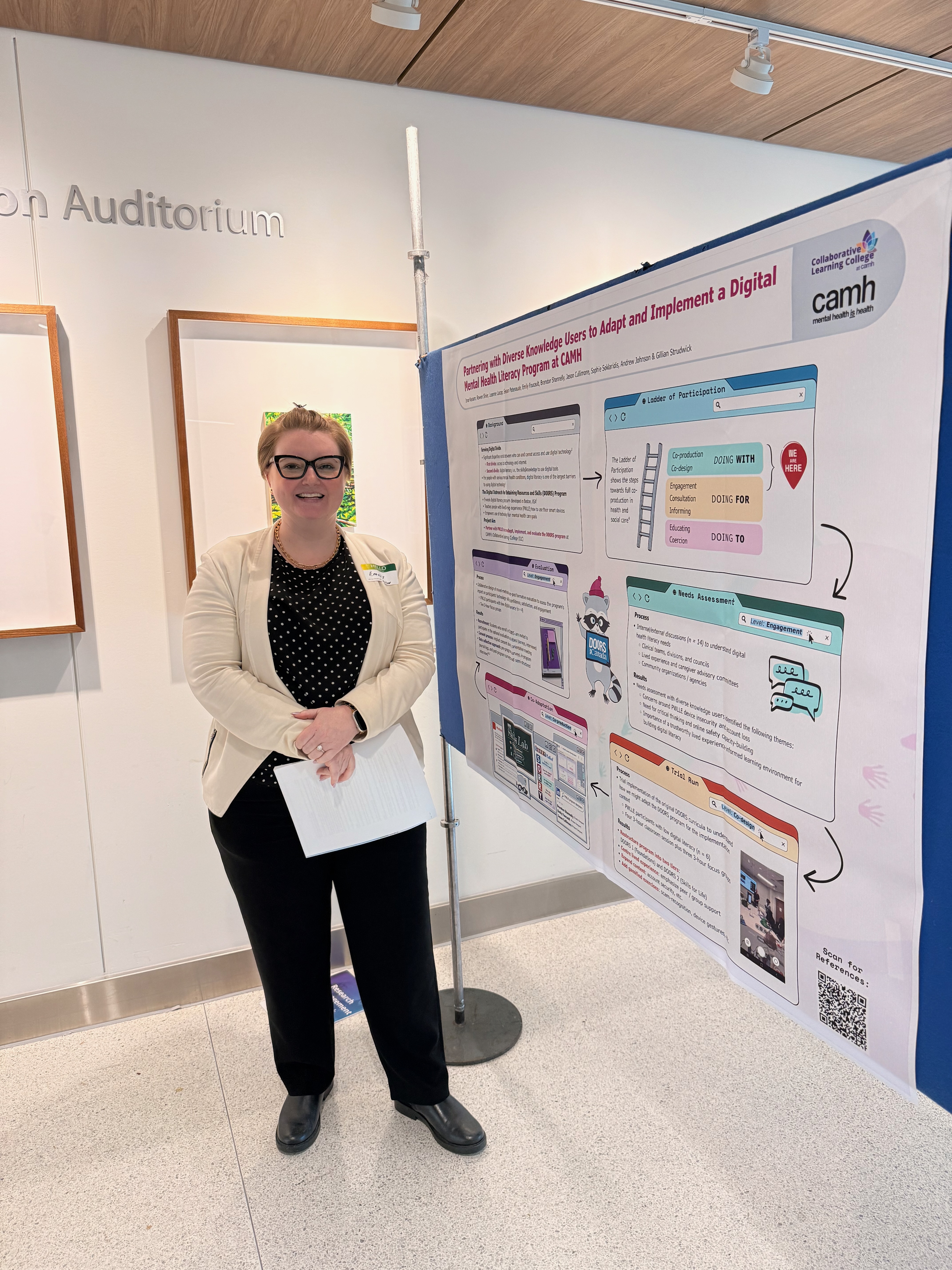Emily Foucault presenting a DOORS Canada poster